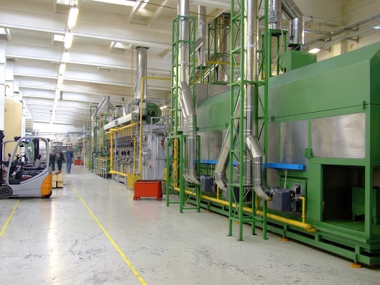 An industrial facility where process dust is produced.